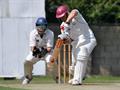 Douglas Philip drives through the covers watched by Carlton 'keeper Jamie Kerr.jpg
